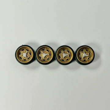 Golden "Rally" Style Steely Wheels with Chrome Knockoffs.