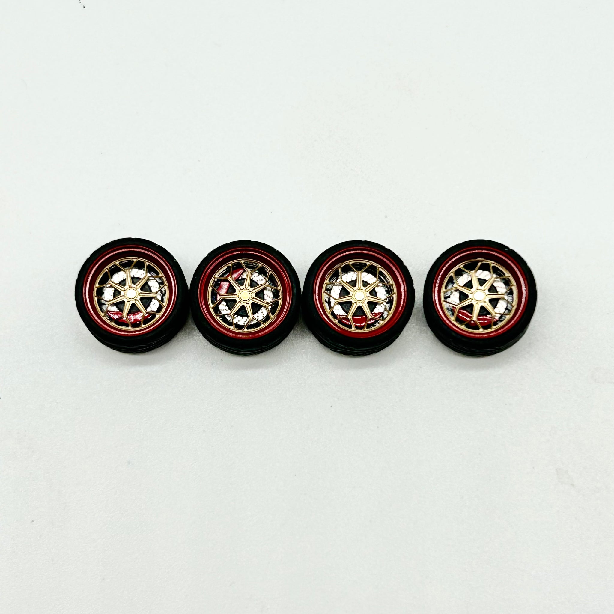 Red and gold alloy spinner wheels 