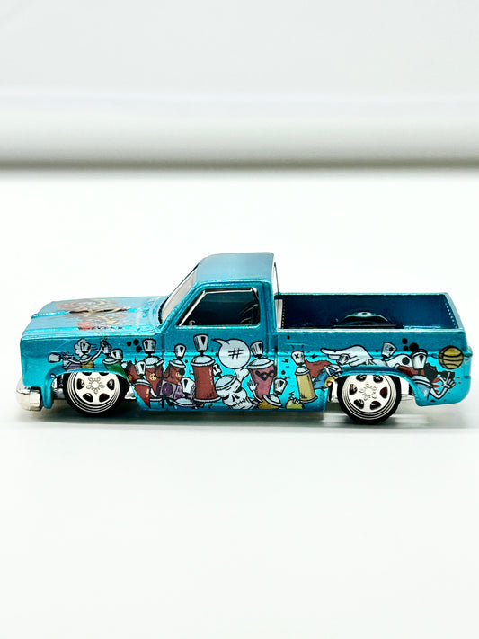 Fully Custom 83 Chevy Silverado “Graffiti” Themed with AC Custon Sunflower Bearing Spinner Wheels