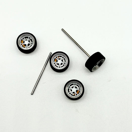 10mm White “Shuriken” Bearing Wheels with Yellow Caliper (Spinners)